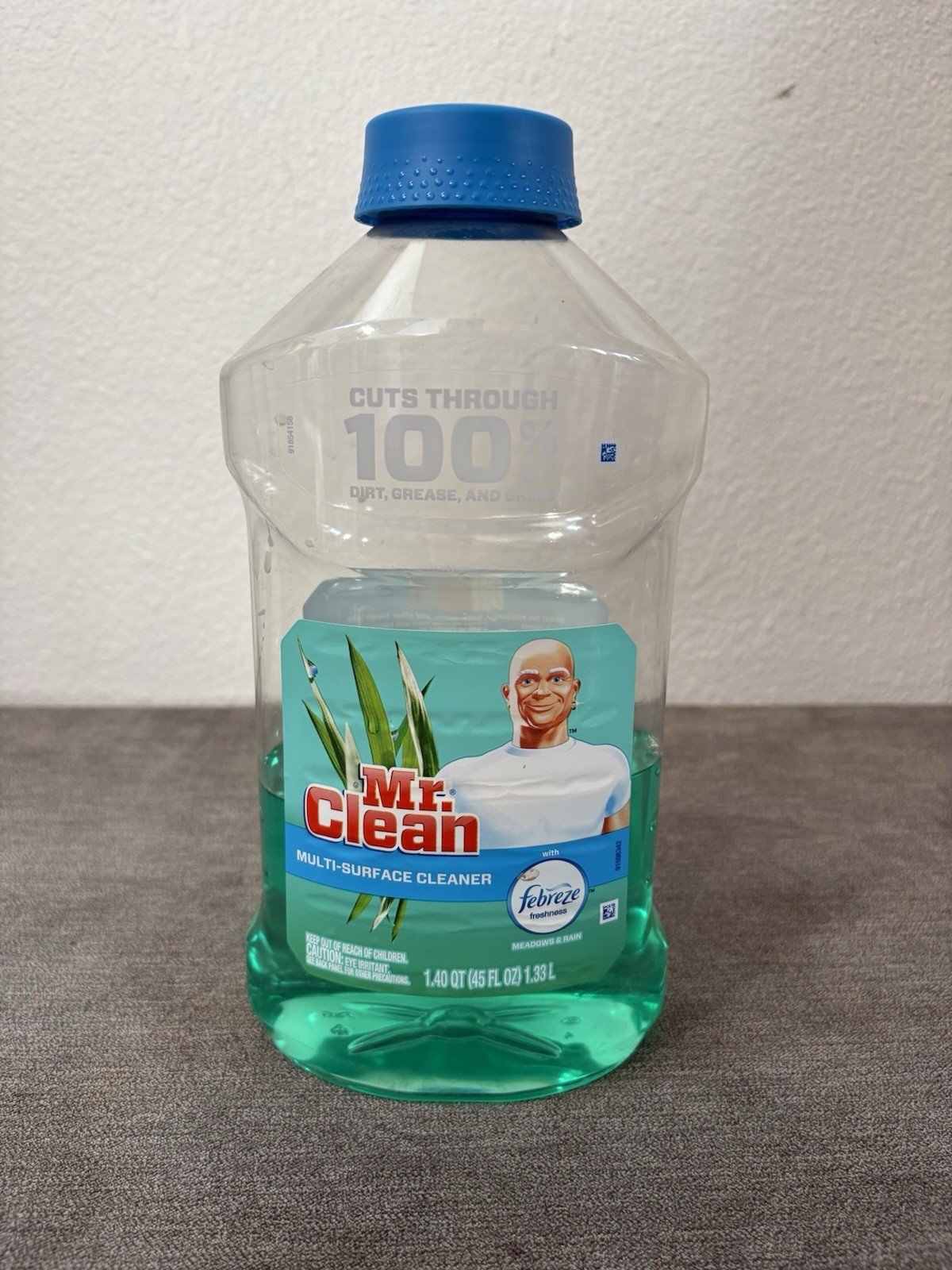Mr. Clean Multipurpose Cleaner with Febreze, Meadows & Rain 44oz Bottle 40% Full