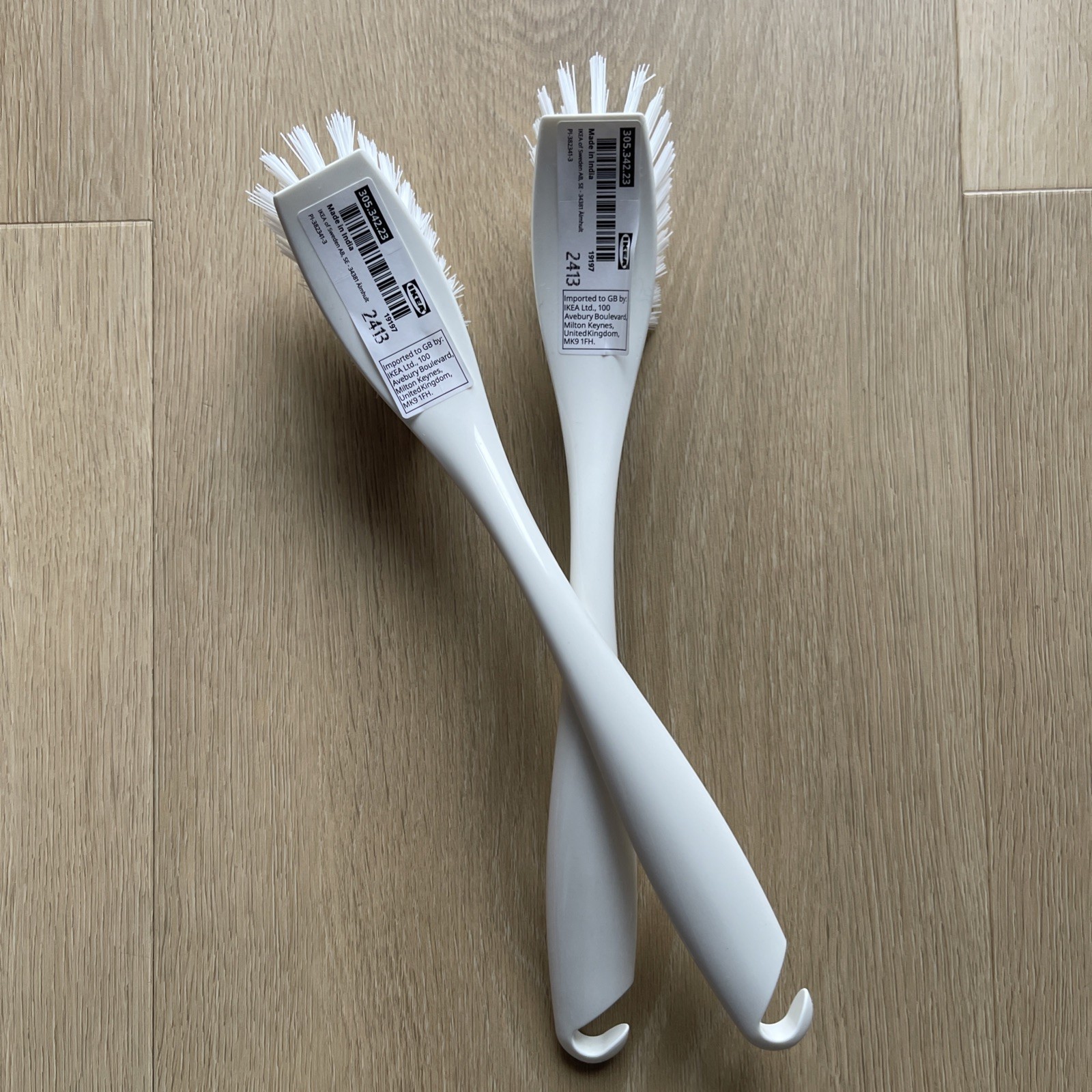 Two white IKEA Hook Cleaning Washing Scrub Brushes-Safe For Nonstick Cookware