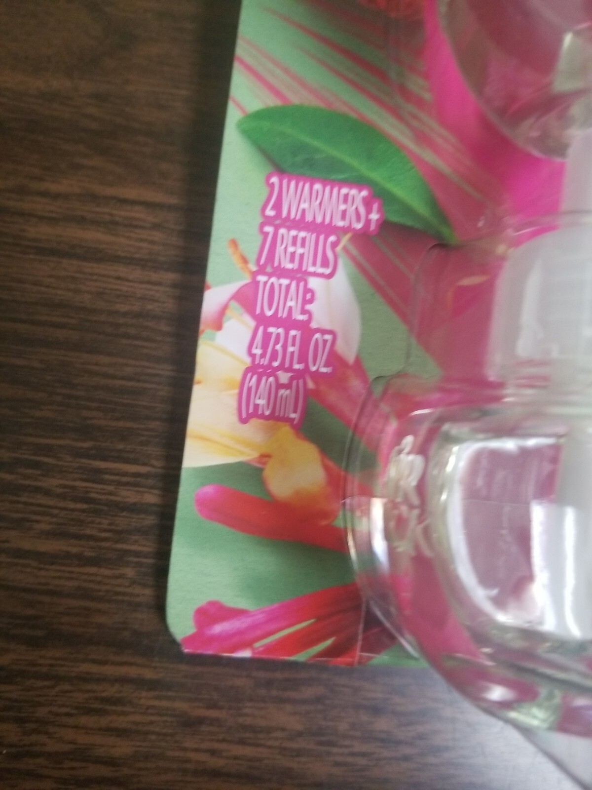 AIRWICK HONEYSUCKLE SCENTED PLUG-IN, UP TO 60 DAYS(7-0.67 oz REFILLS & 2 WARMER)